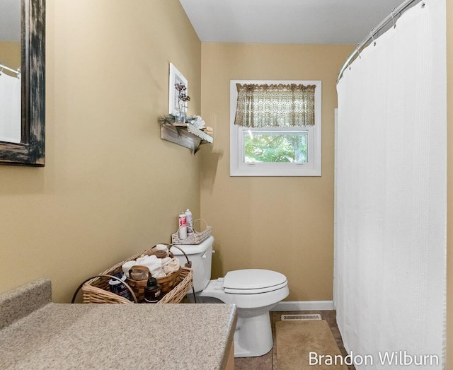 2289 S Sullivan Rd, Ravenna, MI 49451 - full bathroom with a shower with shower curtain and tile patterned floors