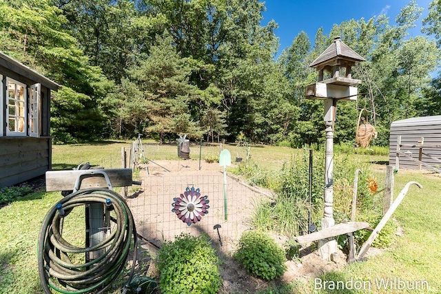 2289 S Sullivan Rd, Ravenna, MI 49451 - view of green lawn with view of scattered trees