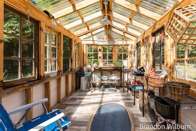 2289 S Sullivan Rd, Ravenna, MI 49451 - sunroom / solarium featuring french doors, lofted ceiling, and wood finished floors