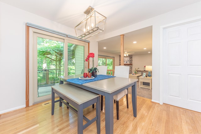 2728 Kimberley Rd, Ann Arbor, MI 48104 - dining room featuring light wood-style flooring, a chandelier, and recessed lighting