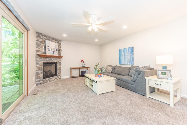 2728 Kimberley Rd, Ann Arbor, MI 48104 - living room featuring light colored carpet, ceiling fan, a stone fireplace, and recessed lighting