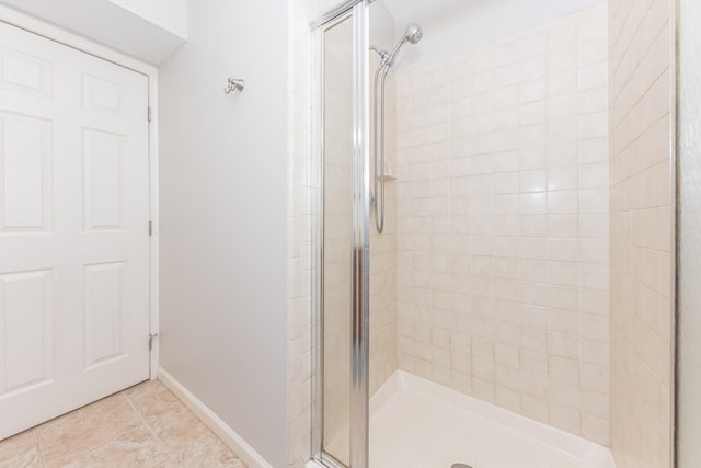2728 Kimberley Rd, Ann Arbor, MI 48104 - full bathroom featuring a stall shower and baseboards