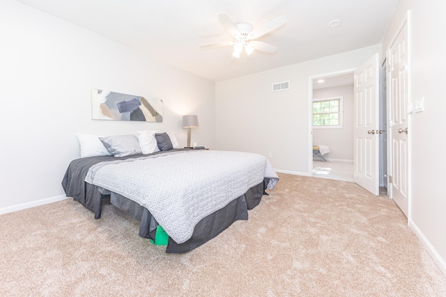 2728 Kimberley Rd, Ann Arbor, MI 48104 - carpeted bedroom featuring baseboards and ceiling fan