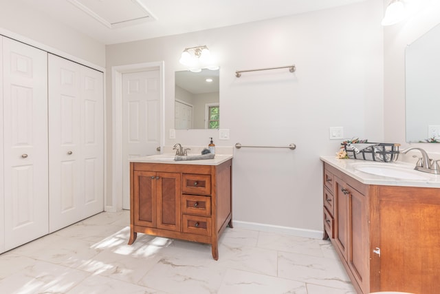 2728 Kimberley Rd, Ann Arbor, MI 48104 - bathroom with marble finish flooring and two vanities