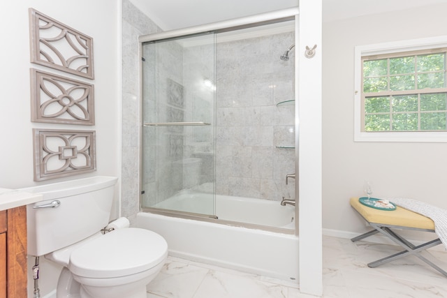 2728 Kimberley Rd, Ann Arbor, MI 48104 - full bathroom featuring marble finish flooring, vanity, and shower / bath combination with glass door