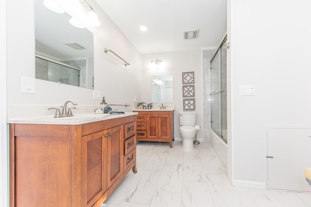 2728 Kimberley Rd, Ann Arbor, MI 48104 - full bathroom with vanity, marble look tiles, and enclosed tub / shower combo