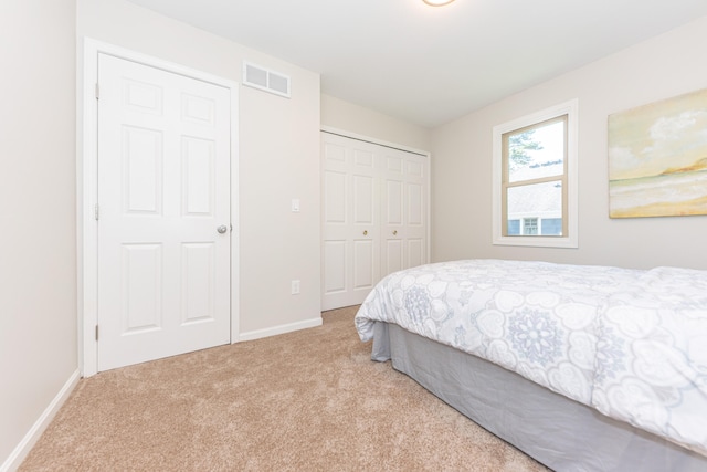2728 Kimberley Rd, Ann Arbor, MI 48104 - carpeted bedroom with baseboards and a closet