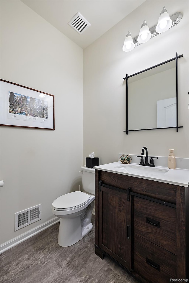 3860 Summit Dr, Sterling Heights, MI 48314 - half bathroom with wood finished floors and vanity