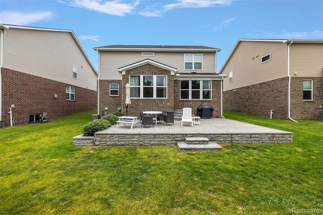 3860 Summit Dr, Sterling Heights, MI 48314 - rear view of property with a patio, a yard, and brick siding