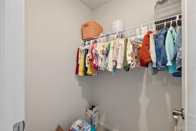 3860 Summit Dr, Sterling Heights, MI 48314 - walk in closet featuring carpet floors