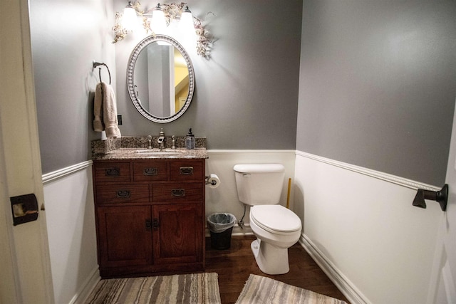 7380 Vassar Rd, Grand Blanc, MI 48439 - half bath featuring wood finished floors and vanity