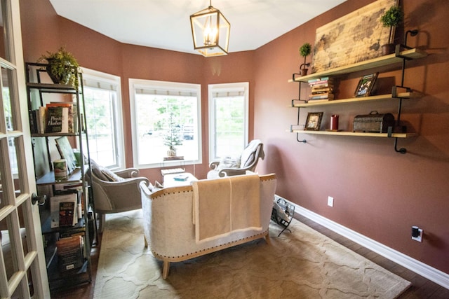 7380 Vassar Rd, Grand Blanc, MI 48439 - living room featuring a chandelier and wood finished floors