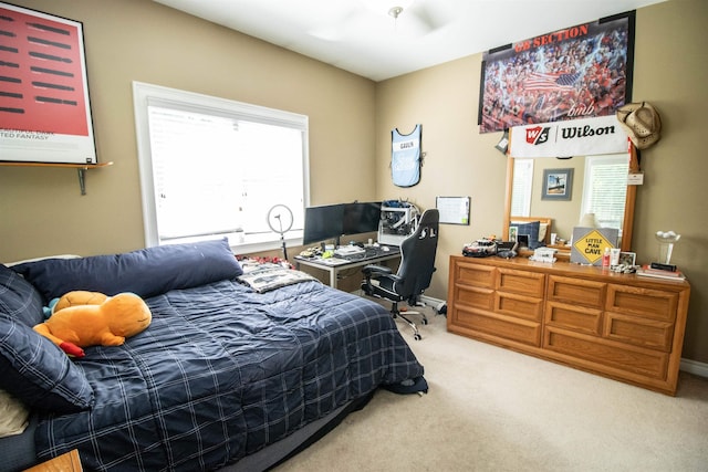 7380 Vassar Rd, Grand Blanc, MI 48439 - carpeted bedroom with an office area and baseboards
