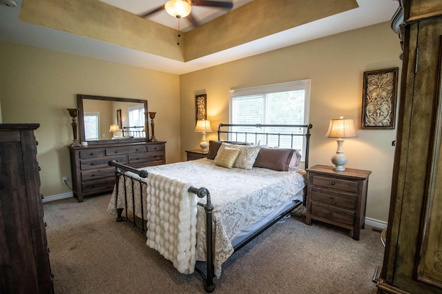 7380 Vassar Rd, Grand Blanc, MI 48439 - carpeted bedroom with baseboards and a ceiling fan