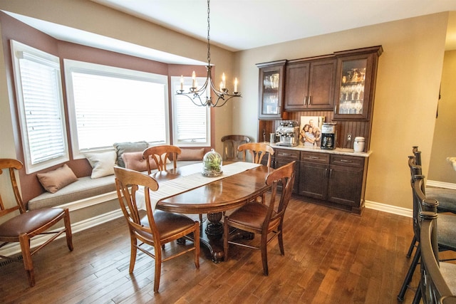 7380 Vassar Rd, Grand Blanc, MI 48439 - dining space with a chandelier and dark wood-type flooring