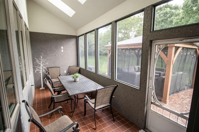 7380 Vassar Rd, Grand Blanc, MI 48439 - sunroom / solarium with a skylight, tile patterned flooring, and high vaulted ceiling