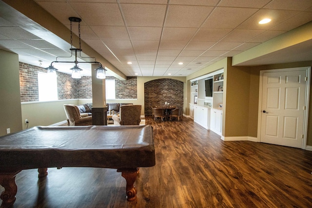 7380 Vassar Rd, Grand Blanc, MI 48439 - rec room with dark wood-style flooring, pool table, a paneled ceiling, and built in shelves