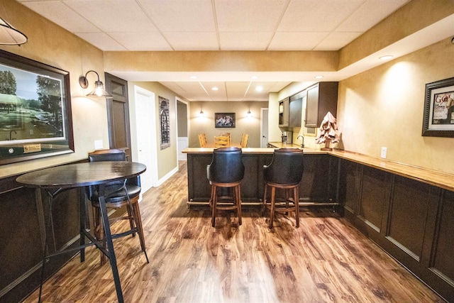 7380 Vassar Rd, Grand Blanc, MI 48439 - indoor wet bar with wood finished floors and a drop ceiling
