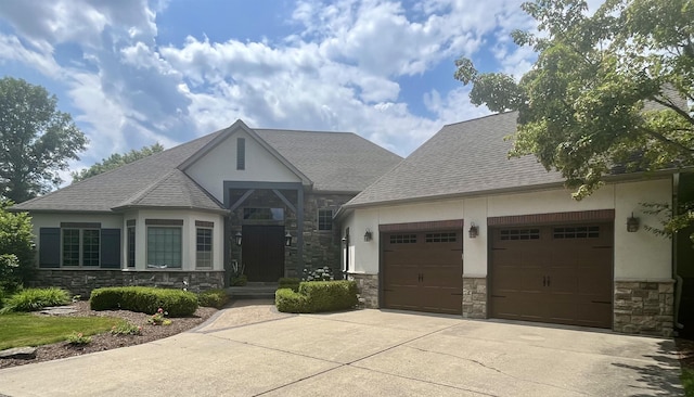 7380 Vassar Rd, Grand Blanc, MI 48439 - view of front of property with stone siding, driveway, stucco siding, and an attached garage