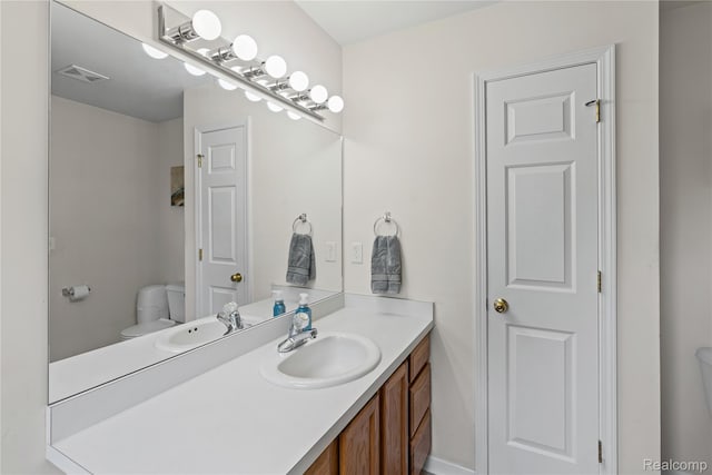 838 Star Dr, Davison, MI 48423 - bathroom with vanity and toilet