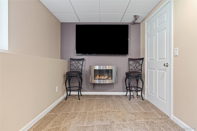 838 Star Dr, Davison, MI 48423 - sitting room featuring a paneled ceiling, carpet, and a glass covered fireplace