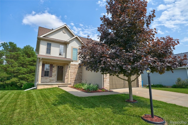 838 Star Dr, Davison, MI 48423 - view of front of home featuring brick siding, a front yard, a garage, and driveway