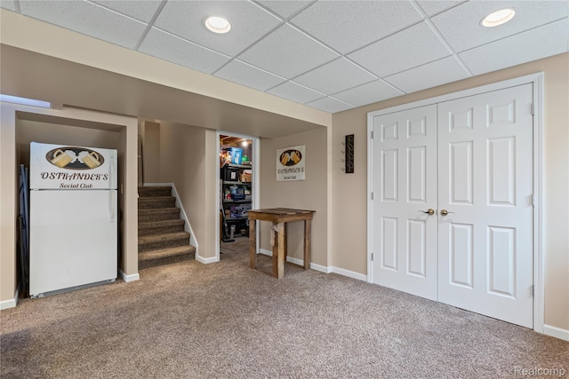838 Star Dr, Davison, MI 48423 - finished below grade area with refrigerator, carpet, a paneled ceiling, recessed lighting, and stairs