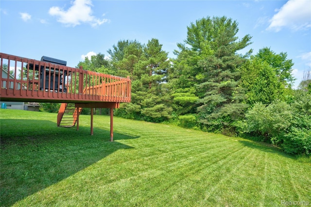 838 Star Dr, Davison, MI 48423 - view of grassy yard with a deck