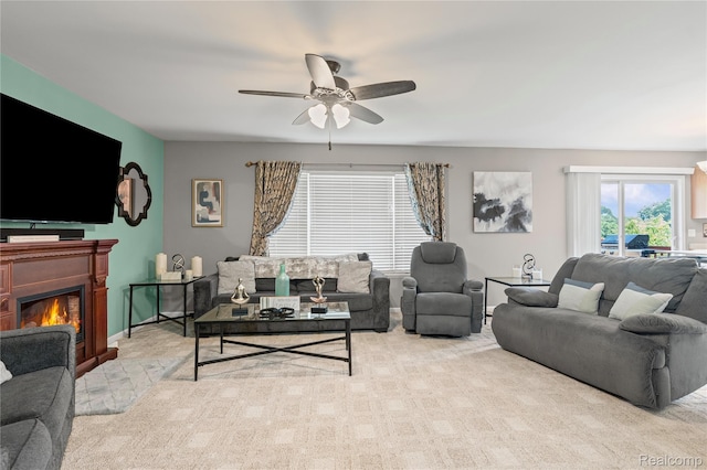 838 Star Dr, Davison, MI 48423 - living area featuring ceiling fan, carpet flooring, and a glass covered fireplace