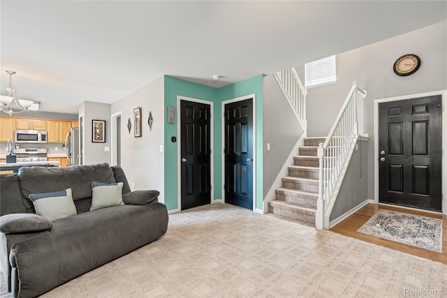 838 Star Dr, Davison, MI 48423 - foyer featuring stairway and a chandelier