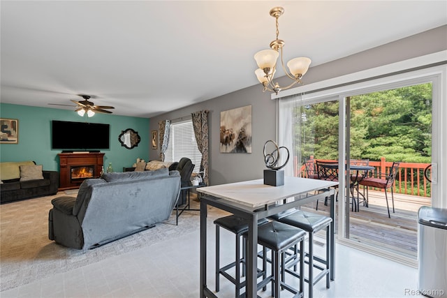 838 Star Dr, Davison, MI 48423 - dining space with a chandelier, healthy amount of natural light, and a ceiling fan