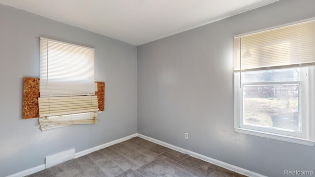 12660 Duchess St, Detroit, MI 48224 - empty room with carpet floors and baseboards