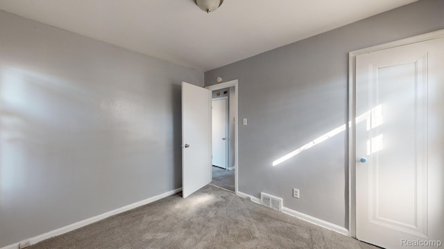 12660 Duchess St, Detroit, MI 48224 - unfurnished bedroom featuring carpet and baseboards
