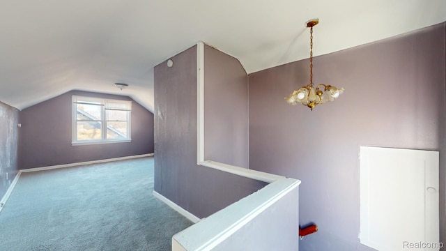 12660 Duchess St, Detroit, MI 48224 - stairs featuring a chandelier, lofted ceiling, and carpet