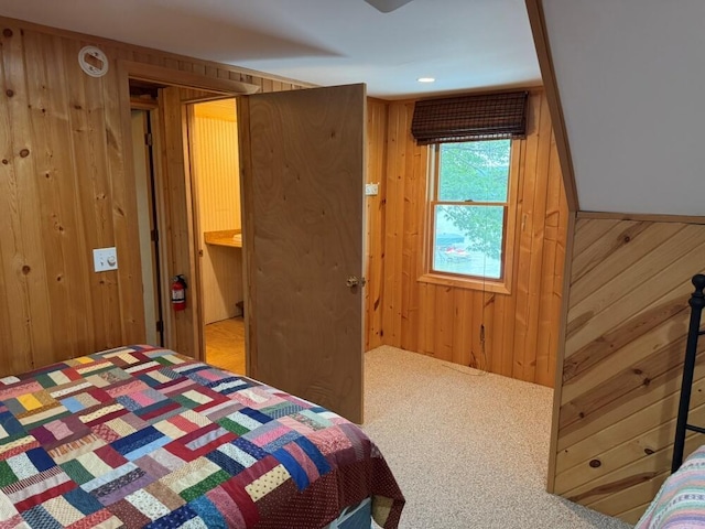 14450 Park Dr, Mecosta, MI 49332 - bedroom with wooden walls and carpet floors