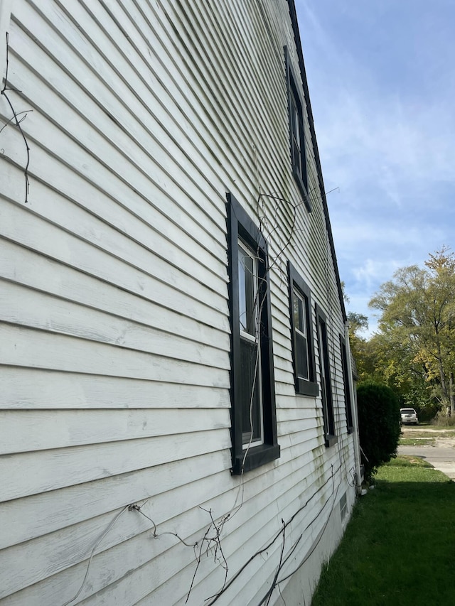 19624 Anglin St, Detroit, MI 48234 - view of home's exterior with a yard