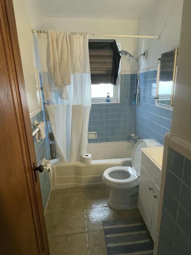 19624 Anglin St, Detroit, MI 48234 - full bathroom featuring shower / bathtub combination with curtain, tile walls, vanity, and tile patterned floors
