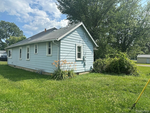 3363 Parkwood Ave, Monroe, MI 48162 - view of property exterior with a lawn
