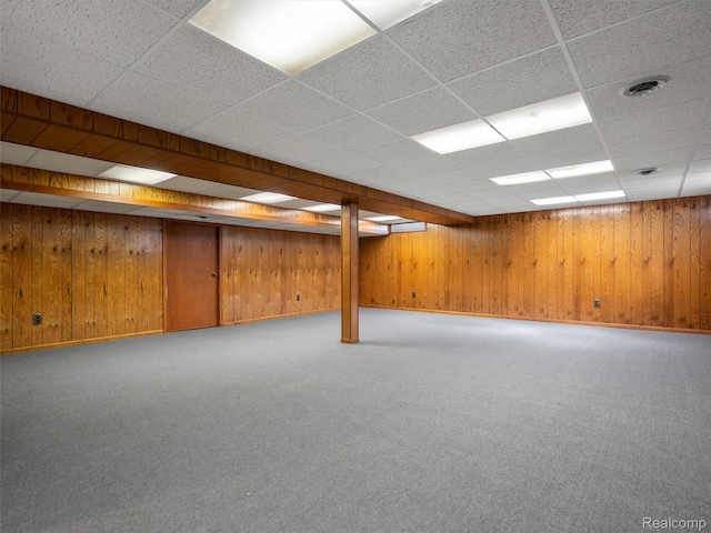 32721 Stoneybrook Ln, Macomb, MI 48026 - finished below grade area featuring a paneled ceiling, wood walls, and carpet flooring