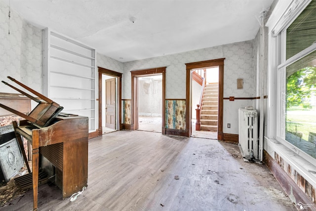 107 W Duncan St, Manchester, MI 48158 - unfurnished sunroom with radiator and healthy amount of natural light