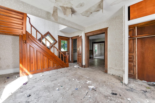 107 W Duncan St, Manchester, MI 48158 - entryway with stairs, plenty of natural light, and wallpapered walls