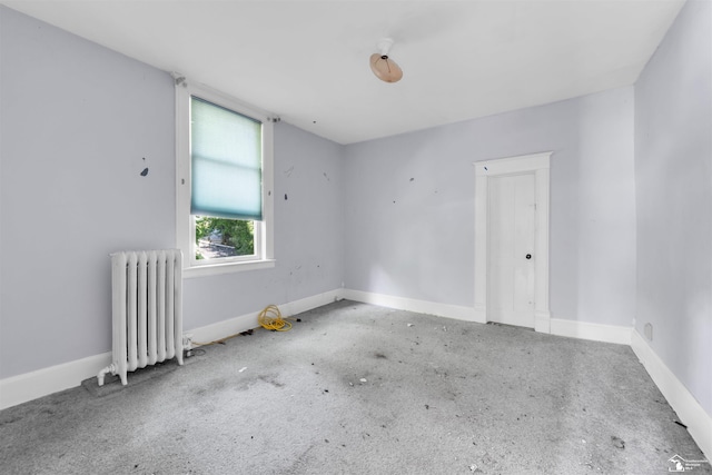 107 W Duncan St, Manchester, MI 48158 - unfurnished room featuring radiator and baseboards