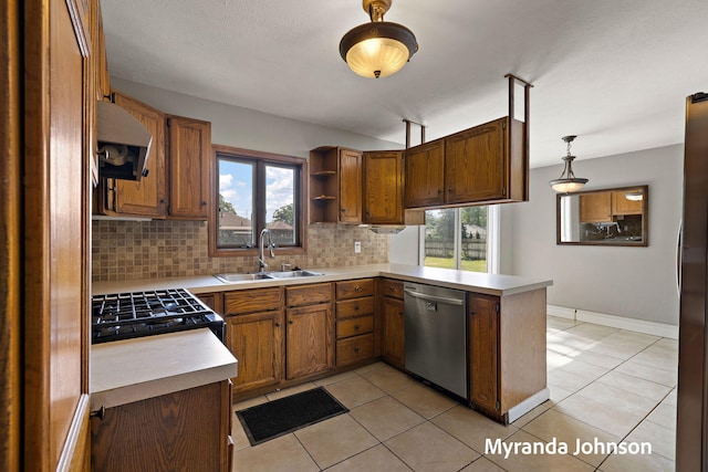 602 Elsa St, North Muskegon, MI 49445 - kitchen with appliances with stainless steel finishes, ventilation hood, tasteful backsplash, light countertops, and open shelves