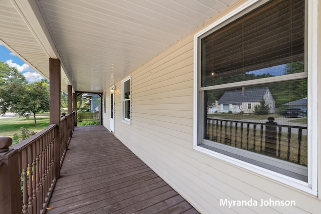 602 Elsa St, North Muskegon, MI 49445 - view of wooden porch