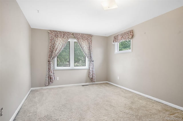 822 Keaton Dr, Troy, MI 48098 - carpeted spare room featuring baseboards