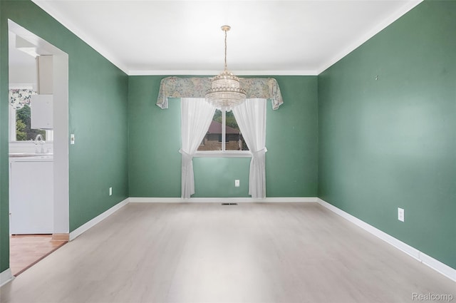 822 Keaton Dr, Troy, MI 48098 - spare room with a chandelier, plenty of natural light, and crown molding