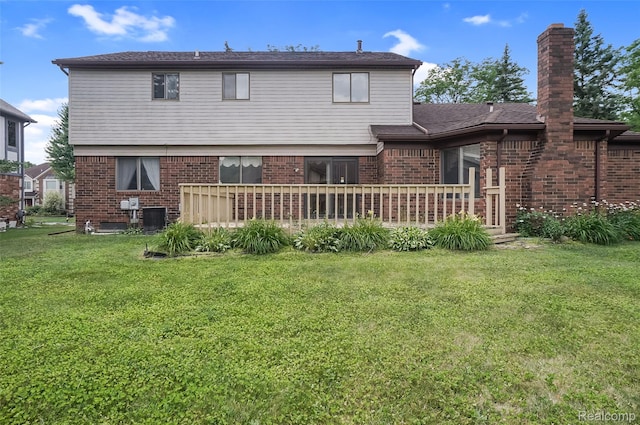 822 Keaton Dr, Troy, MI 48098 - back of house featuring brick siding, a yard, a chimney, and a deck