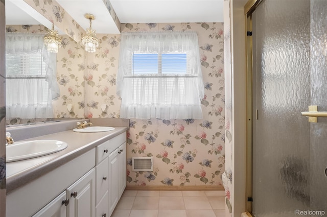 822 Keaton Dr, Troy, MI 48098 - bathroom featuring wallpapered walls, double vanity, a stall shower, and tile patterned floors