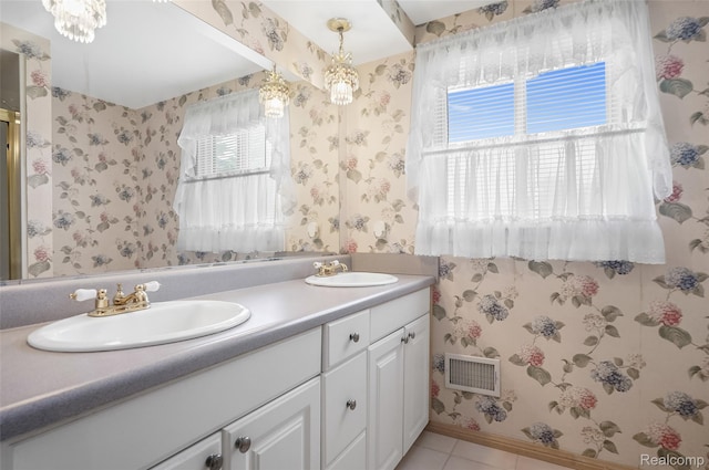 822 Keaton Dr, Troy, MI 48098 - full bath with wallpapered walls, double vanity, and tile patterned floors