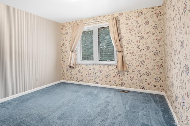 822 Keaton Dr, Troy, MI 48098 - carpeted spare room with wallpapered walls and baseboards